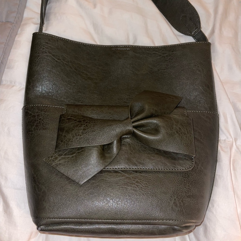 Anthropologie purse green with an insert that functions as a clutch